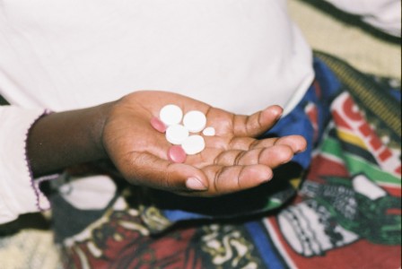 TB medications held in hand